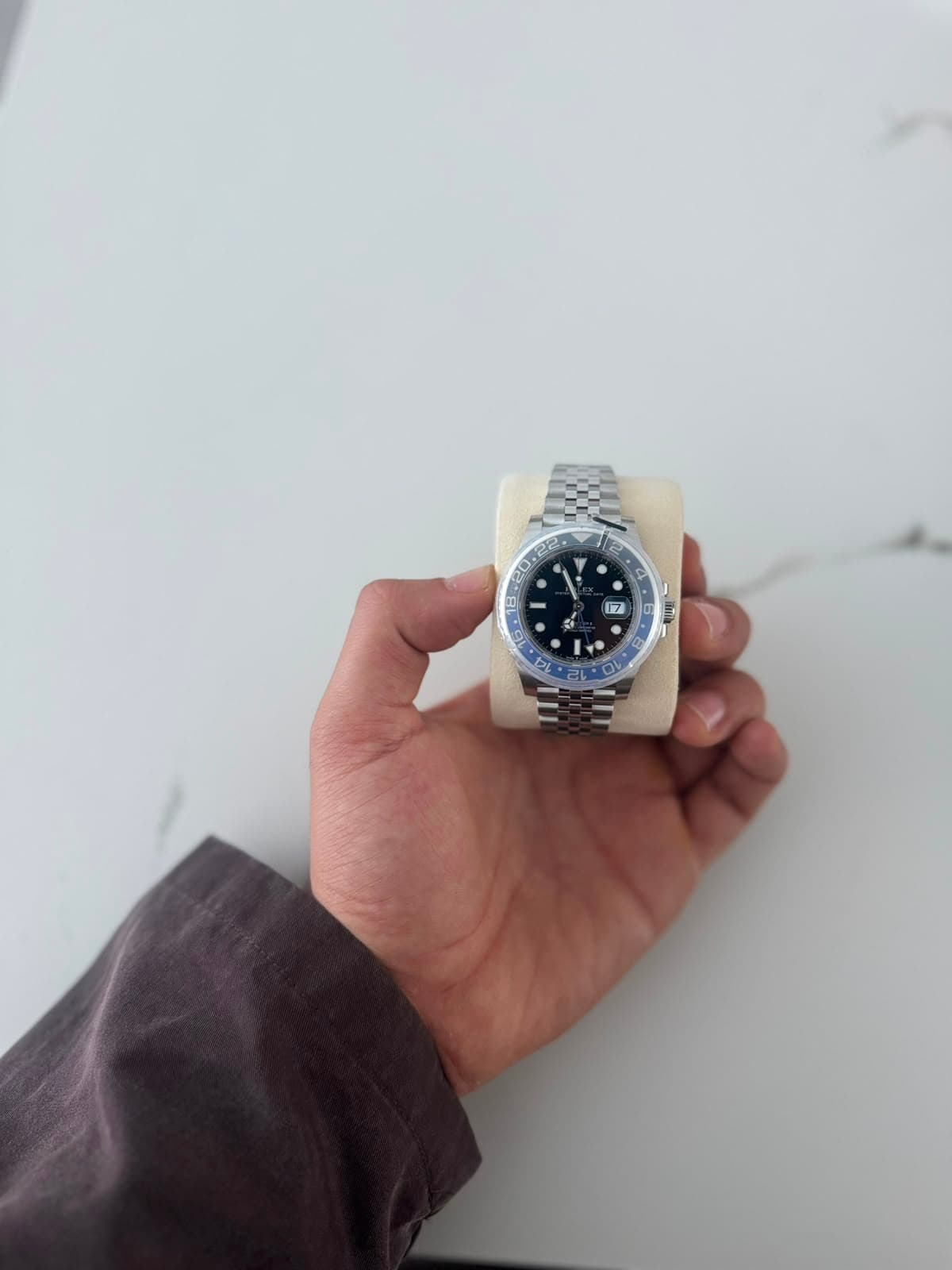 Rolex GMT-Master II Batman on white marble