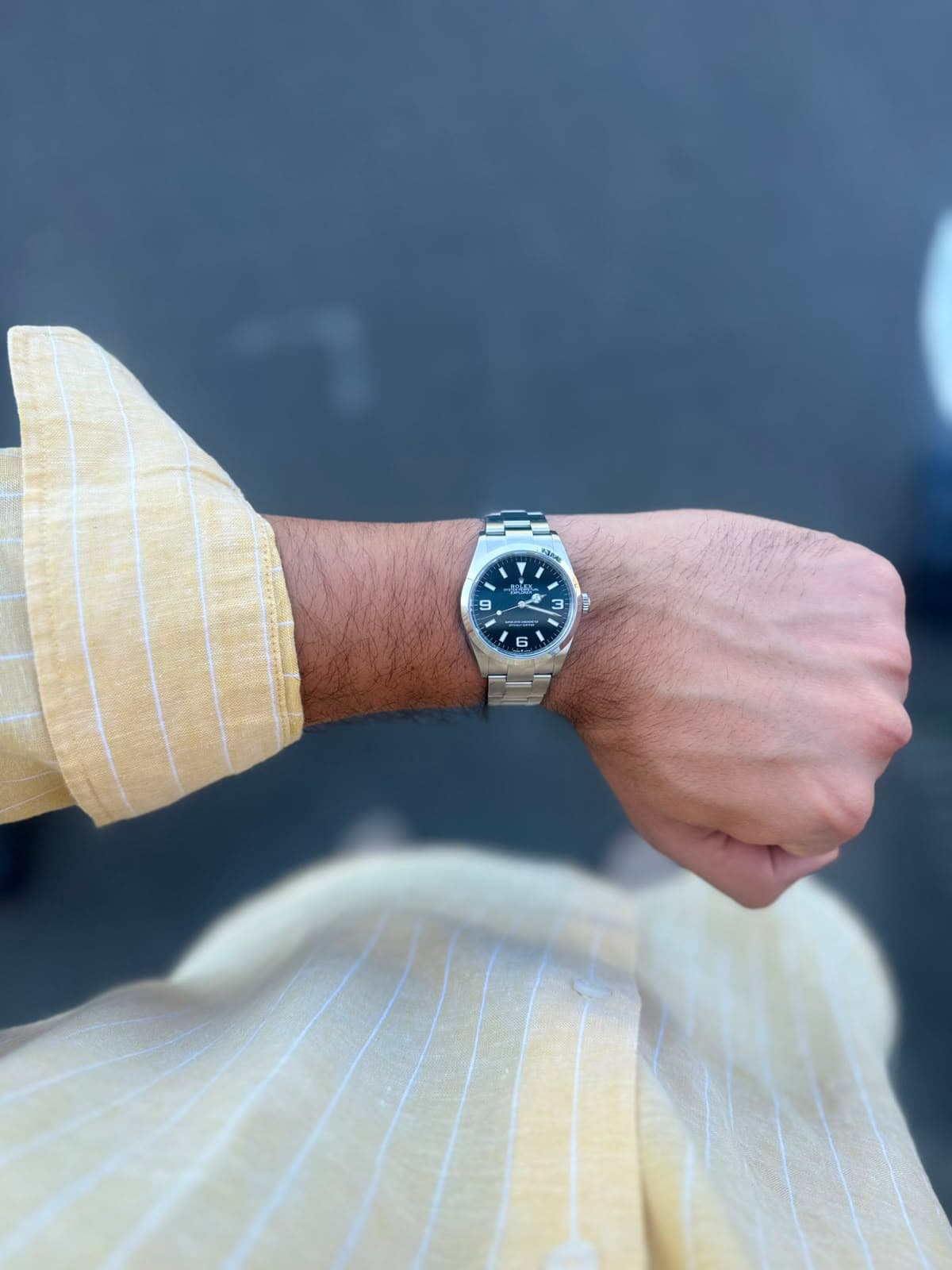 Rolex Explorer against a dark wall